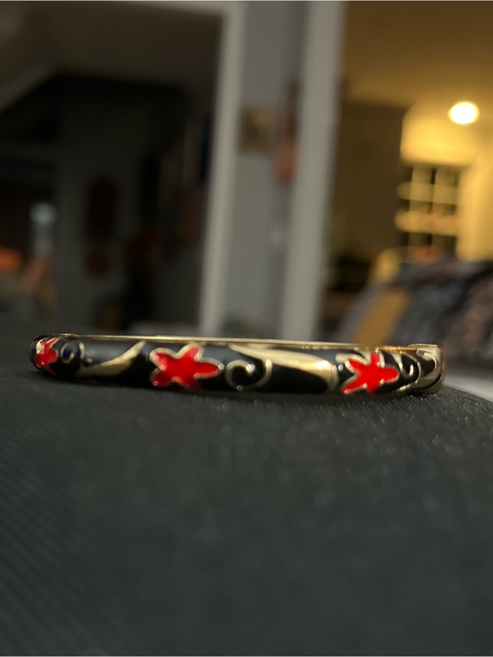 Gold-Tone Black Enamel Bangle with Red Flower Accents